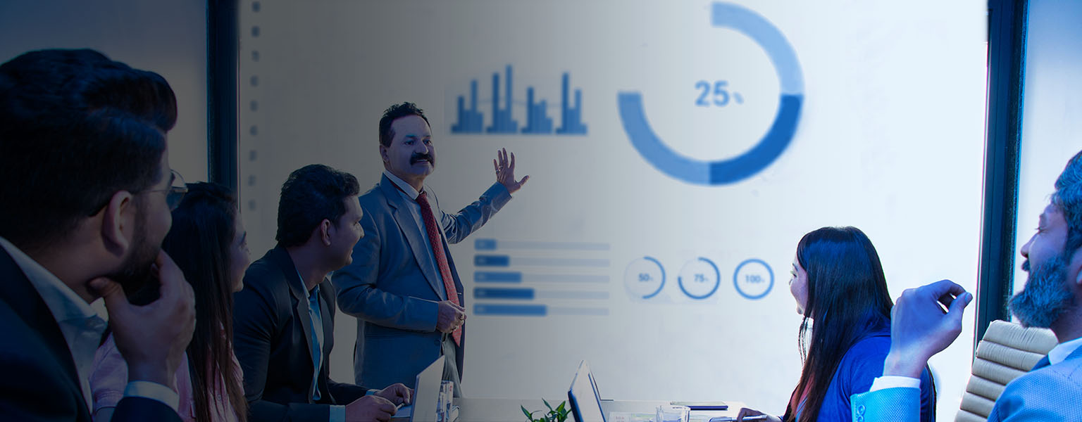 Business people in conference room in front of presentation